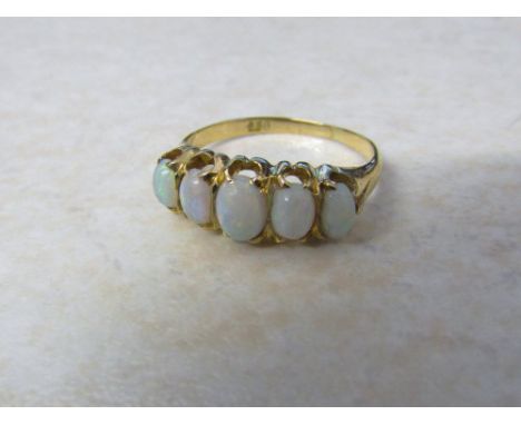 Tested as 18ct gold 5 stone opal ring size M