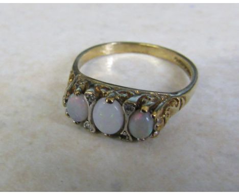 9ct gold three stone opal ring with diamond accents size M weight 2.4 g