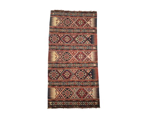 A SHIRVAN KILIMapproximately 289 x 126cmCondition Report: Generally of fair, tidy condition for its age and use.Some minor we