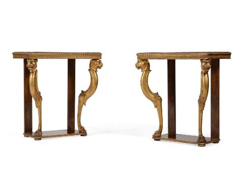 Y A PAIR OF ROSEWOOD AND PARCEL GILT CONSOLE TABLESIN REGENCY STYLE, 19TH CENTURY ELEMENTS AND LATER82cm high, 78cm wide, 42c