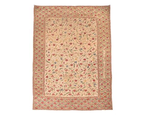 A SUZANI EMBROIDERY PANEL 19TH CENTURY, CENTRAL ASIA Bokhara manner with open central field with repeating floral swags withi