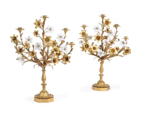 A PAIR OF FRENCH ORMOLU AND GLASS MOUNTED SIX-LIGHT CANDELABRA LATE 19TH/EARLY 20TH CENTURY Each modelled as vase of lilies, 