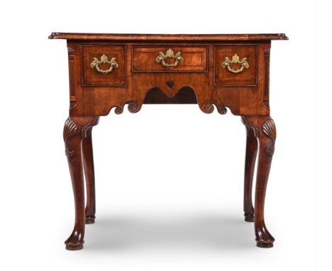 A GEORGE II WALNUT LOWBOYIN THE MANNER OF GILES GRENDEY, CIRCA 173073cm high, 79cm wide, 48cm deepProvenance: Private Collect