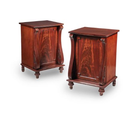 A PAIR OF GEORGE IV MAHOGANY BEDSIDE CUPBOARDSCIRCA 1825Each with a panel door flanked by scrolled pilasterseach 77cm high, 5