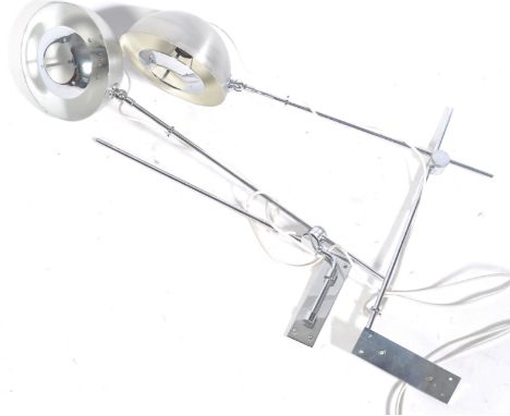 A pair of 1970's retro vintage chrome and aluminium wall light fixtures, each having a chromed wall brackets and articulated 