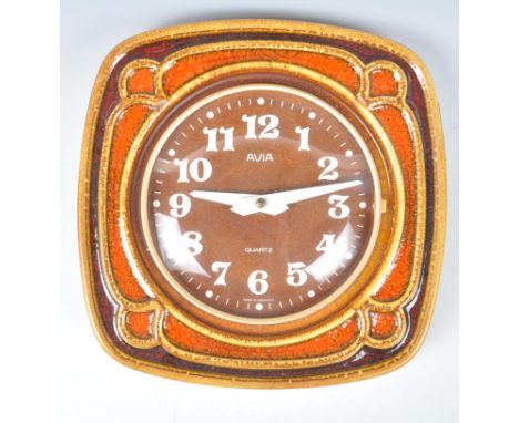 Avia - Quartz - West German - A 1960's retro vintage studio art pottery wall clock of square form having an Arabic chapter ri