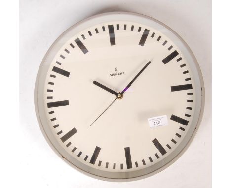 Siemens - An original 1960's retro vintage industrial factory / station clock having a white enamel face with bold baton nume