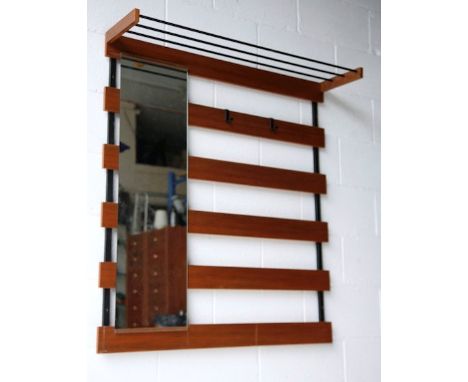 An original 1960's Danish retro vintage teak wood coat rack wall mounted hall stand. Slatted construction comprising mirror t