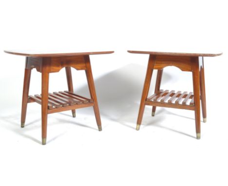 A pair of original retro vintage 1970's teak wood coffee / occasional tables. Squared tops, with slatted shelf beneath, raise