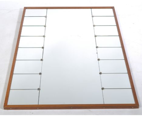 Ag Glas &amp; Tra (G&amp;T) - A 1970's Swedish retro vintage teak framed panelled wall mirror having a long central rectangul