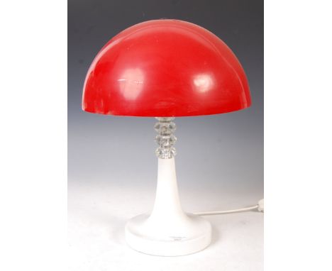 An original 1970's retro vintage table work desk lamp light having a red enamel mushroom form shade raised on white enamel tu