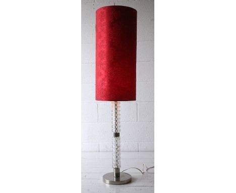 An original 1970's retro vintage glass and chrome floor standing standard lamp comprising of a chromed round base with a twin