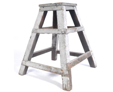 A vintage industrial wooden shop display stand / planter / plant stand. Possibly from a Florist's shop. Wooden construction, 