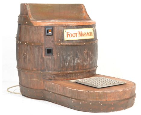 An original vintage fairground / funfair ex-Wookey Hole ' Foot Massager ' arcade slot machine game. Shaped in the form of a b