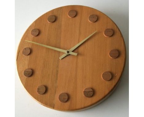 Aarikka Finland - An original contemporary pine wall clock of wooden construction with gilt brass faceted hands and circular 