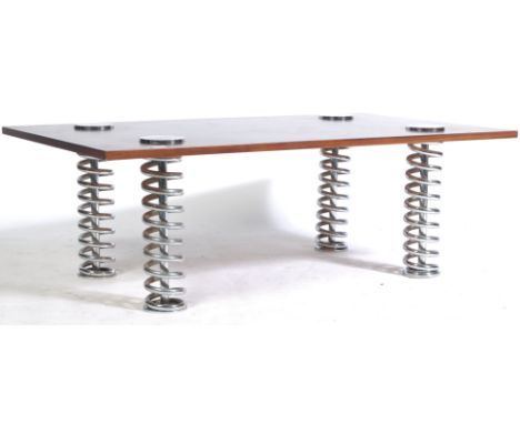 Pieff Edel - An exceptional 1970's retro vintage teak wood and chrome spring coffee table. Having a rectangular wooden table 