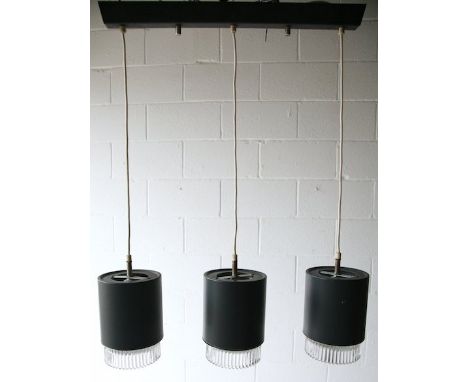 A stunning 1970's retro vintage triple drop pendant ceiling light fixture having a wide bar ceiling rose in dark grey suspend