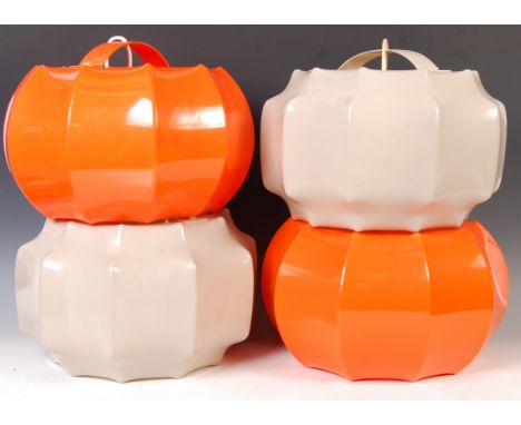 A set of four original 1970's retro vintage ceiling light lampshades of ribbed plastic construction. Comprising of two pairs 