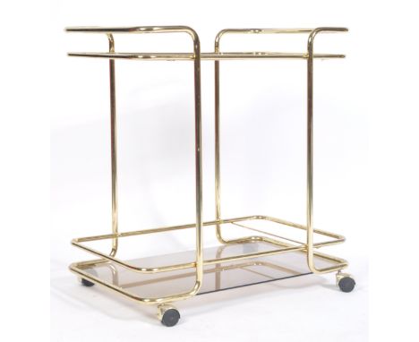 A 1970's Italian retro vintage bar cart two tier drinks / cocktail trolley having a brass plated tubular metal construction w