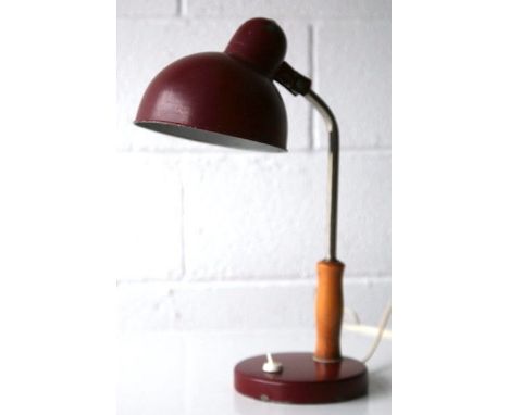 An unusual 1930's art deco retro vintage table / desk lamp comprising of a red round base with with, turned oak stem, sweepin