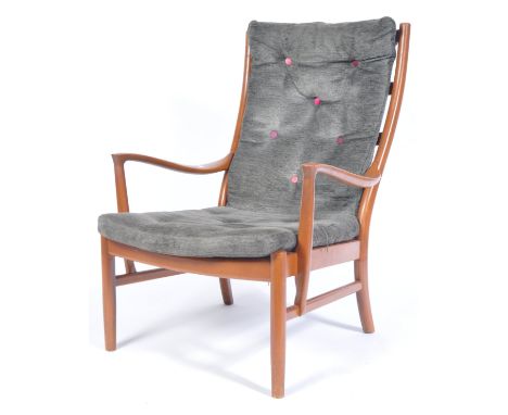 Parker Knoll - PK1016/7/8/9 - A 20th century retro vintage teak wood easy / lounge chair / armchair having a tall slatted lad