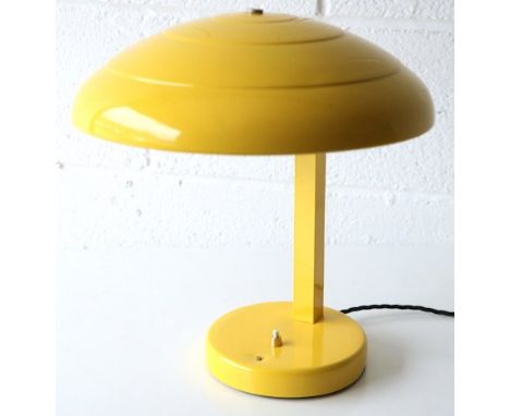 C.A.T. - A 1940's Belgian retro vintage desk / table lamp having a domed stepped U.F.O. shade raised on a square column and r