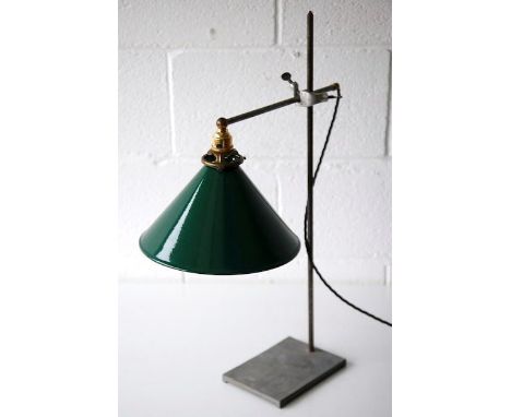 A 20th century retro vintage two tone enameled green and white conical lamp shade with brass fitting attached to a vintage sc
