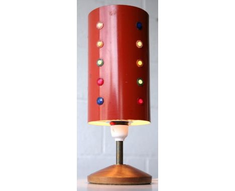 A 1960's retro vintage teak wood side / table lamp comprising of a small round teak base with brass column supporting a stunn