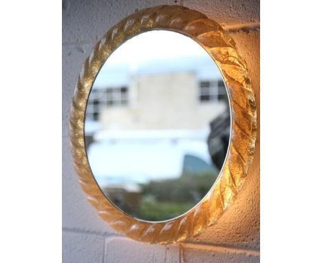 Hillebrand - A 1960's retro vintage round illuminating vanity wall mirror having a textured lucite platted surround and metal