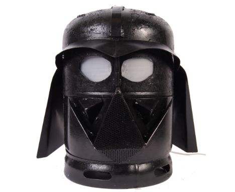 A 20th century unique Star Wars inspired ' Darth Vader ' steel lamp. Steel construction, with hood to rear, corrugated lenses