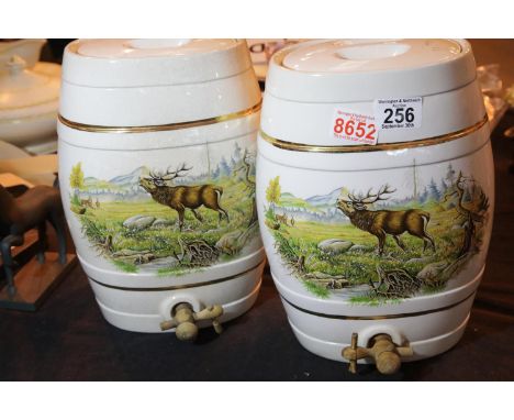 Pair of vintage ceramic drink dispensers with spigots and stag decoration. Not available for in-house P&amp;P. 