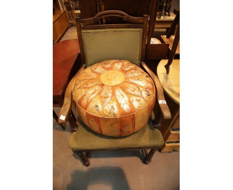 Victorian oak gentlemans chair and a circular leather pouffe. Not available for in-house P&amp;P. 