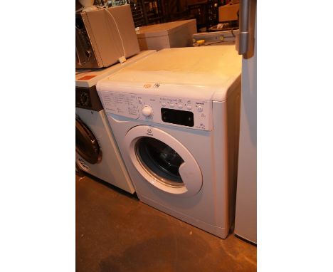 Indesit A+ class 1WE91281 1.9kg water balance washing machine. Not available for in-house P&P.Condition Report: All electrica