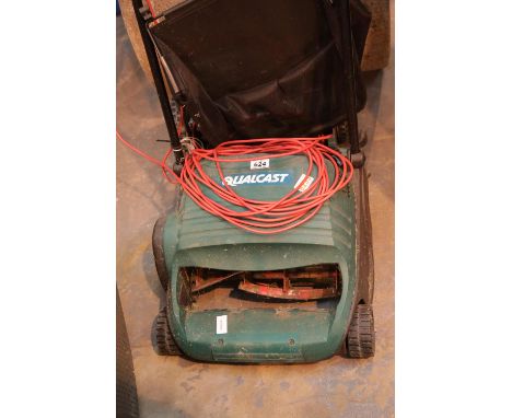 Qualcast electric lawnmower with grass box. Not available for in-house P&P. Condition Report: All electrical items in this lo