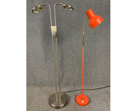 A vintage floor standing adjustable spotlight and a contemporary chrome double spot lamp. H.136cm (largest) 
