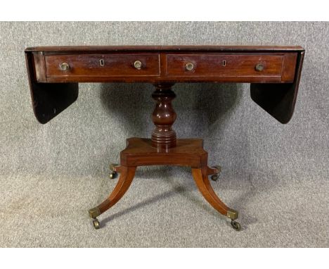 Sofa table, Regency mahogany drop flap on quadruped swept supports. H.72 W.94 (154 extended) D.59cm