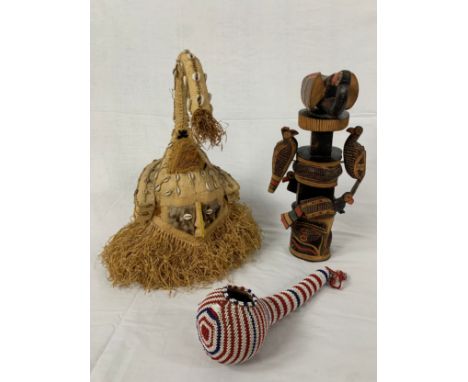 Congolese Kuba helmet mask, a carved totem and a beaded tribal folk item. H.50cm (largest)