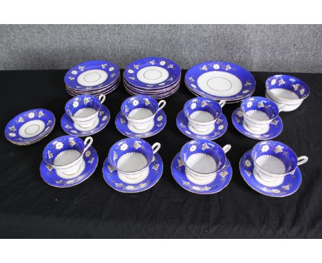A Hawkins, mid 20th century porcelain part tea service. Dia.23cm. (largest).
