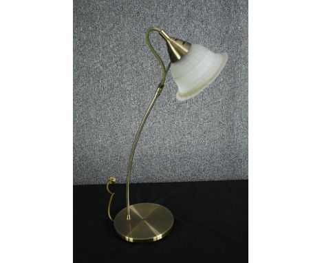 A brass desk lamp with a frosted glass shade. H.62cm. 