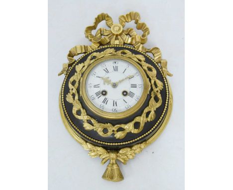 Louis XVI style wall clock, having a white enamel Roman dial with outer Arabic minutes and gilt hands, signed movement marked