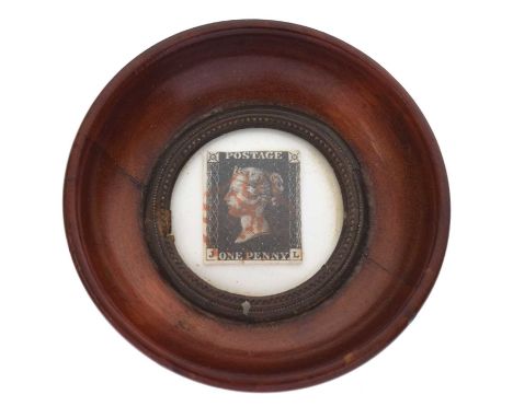 Victorian Penny Black postage stamp in circular mahogany frame