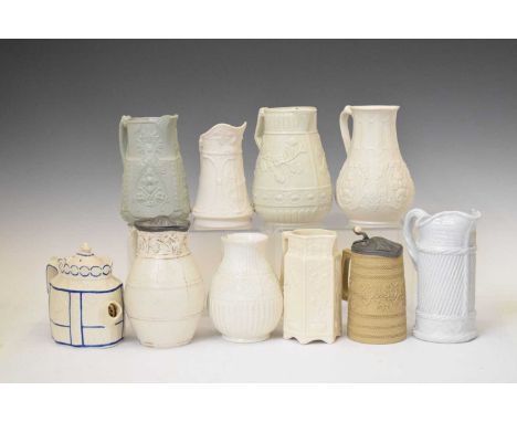 Collection of mainly 19th century relief-moulded stoneware jugs, to include an example commemorating the First Transatlantic 