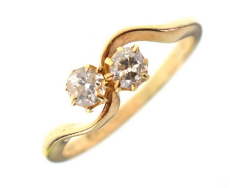 18ct gold crossover ring set two old cut diamonds, size K½, 2.4g gross approx