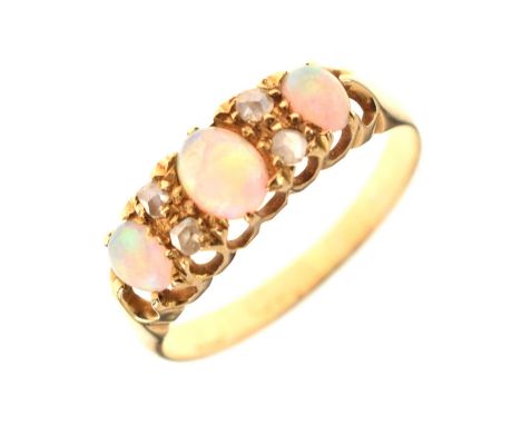 18ct gold opal and diamond ring, the three opals with two rows of rose cut diamonds in between, size P approx, 2.4g gross app