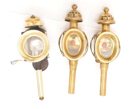 Pair of brass carriage lamps, 40cm high, together with a singular carriage lamp, 39cm high (3)