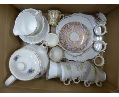 A Colclough Art Deco part tea set with Windsor teapot, a Colclough chintz part tea set and four Royal Worcester flower encrus