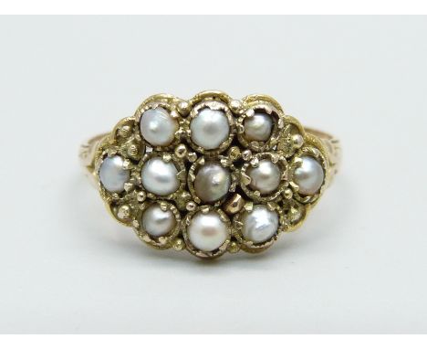 A yellow metal and seed pearl ring, 2.6g, Q 