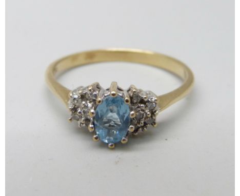 A 9ct gold, blue stone and diamond ring, 2g, O 