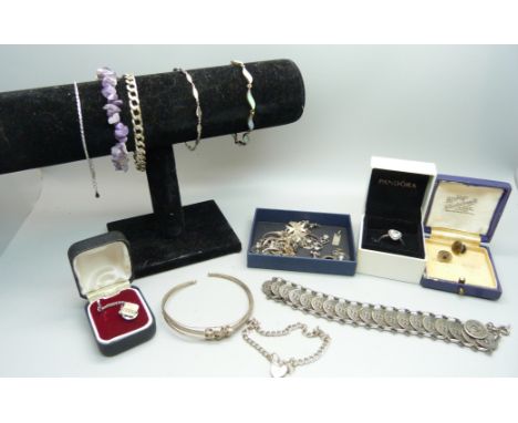 A silver Pandora ring, a silver necklace, four silver bracelets, an amethyst quartz bracelet, earrings, etc., (curb link brac