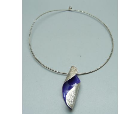 A silver and enamel necklace 